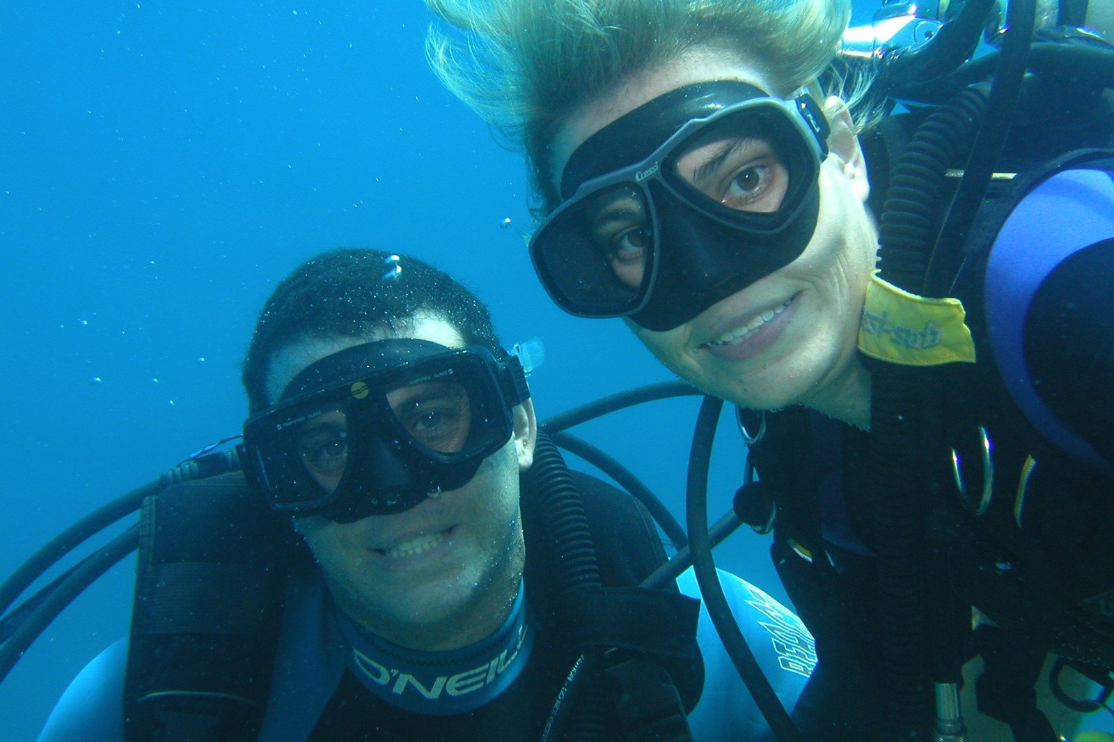 An image showcasing a travel planner working with a client, reviewing maps and discussing tour options. The atmosphere is collaborative and friendly. Warm lighting, 4k resolution.